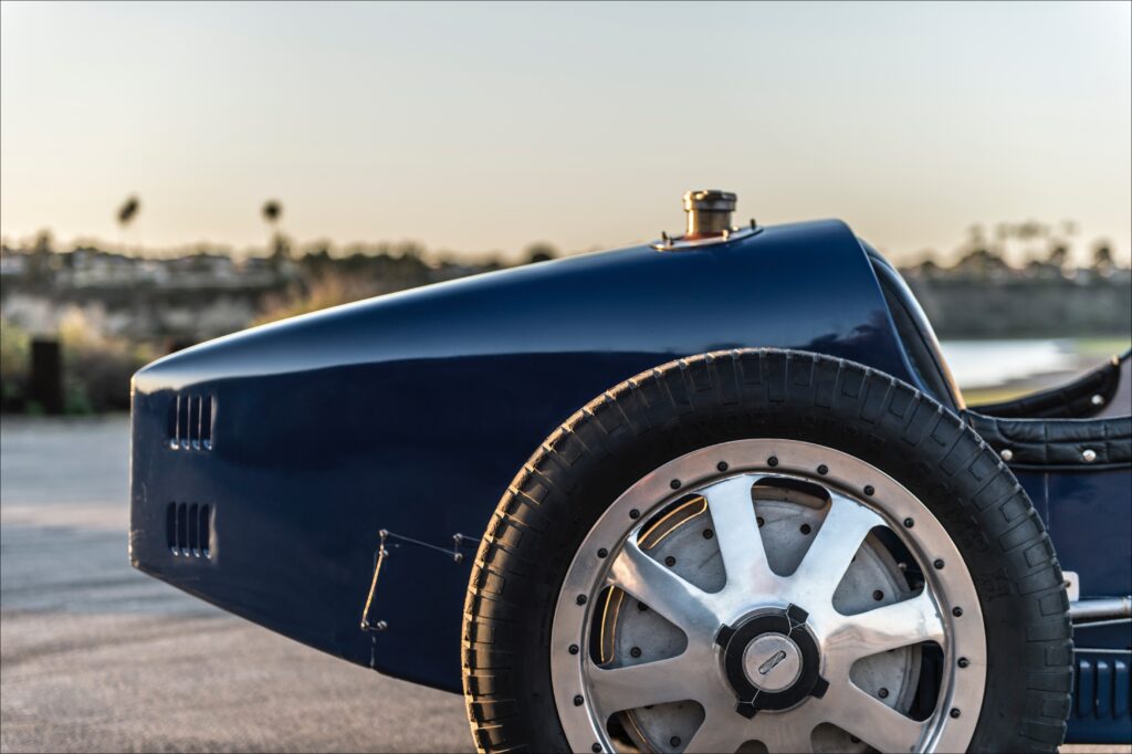  Note that drum brake is integral with alloy wheel. Wheel spokes help cool the brakes. They’re reliable and surprisingly effective, in part because there is so little mass to slow down. 