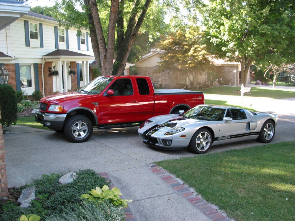 THe development car after completion of the cross-country dash, sitting in Bob Brown's driveway next to the daily driver F-series favored by Brown. 
