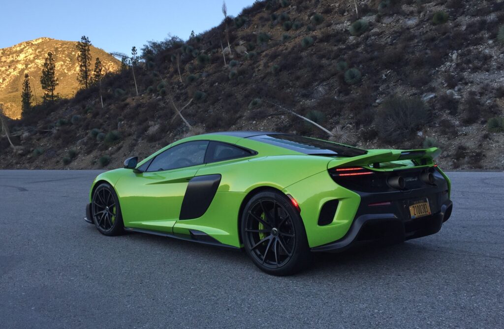 Rear three-quarters is the car’s best view. Seen in the broad side mirrors, the rear fenders are a view to remember. 