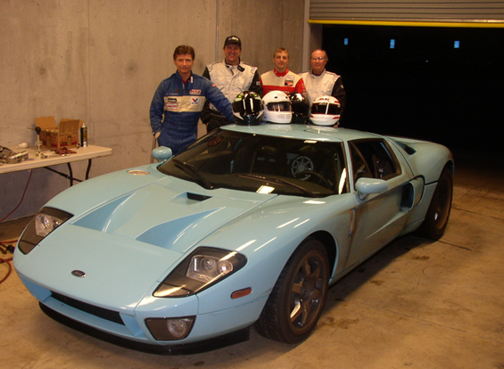 Second from left is Andy Slankard, who worked on chassis development. He was once a race driving instructor at Riverside Raceway. 