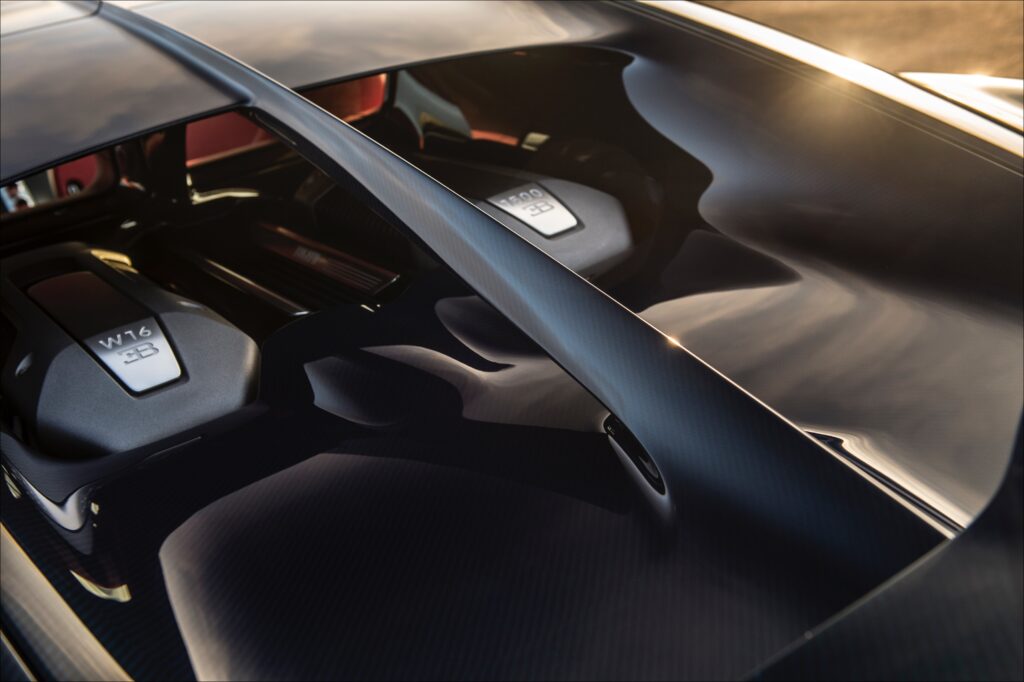 Engine is essentially four high-output 2-liter engines joined on a common crankshaft. It packages well, essentially a dense, furious cube. Transmission sits ahead of the engine, right under your elbow. 