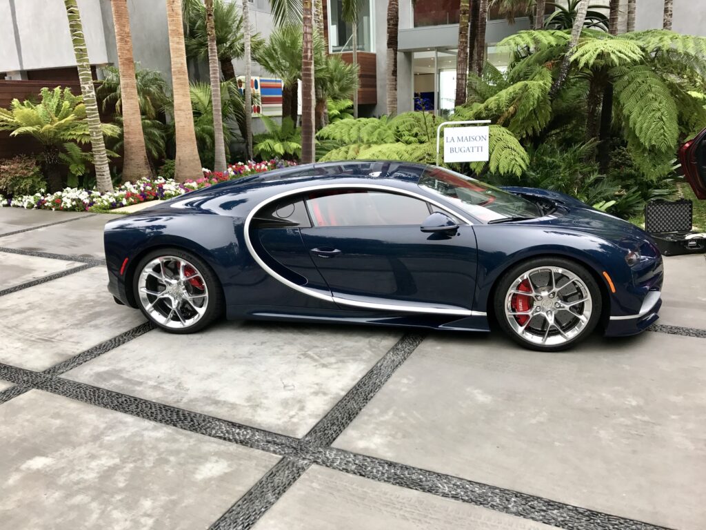 Bugatti curve defines the A-pillars, roofline and side air intakes, an Art Deco sculpture interpreted for a 21st Century speedwagon.
