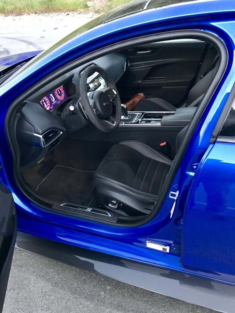 The office. Ample headroom, and legroom for NBA point guards. It’s a comfortable, upright and roomy place to conduct business. More than adequate adjustment to steering wheel reach and angle.  