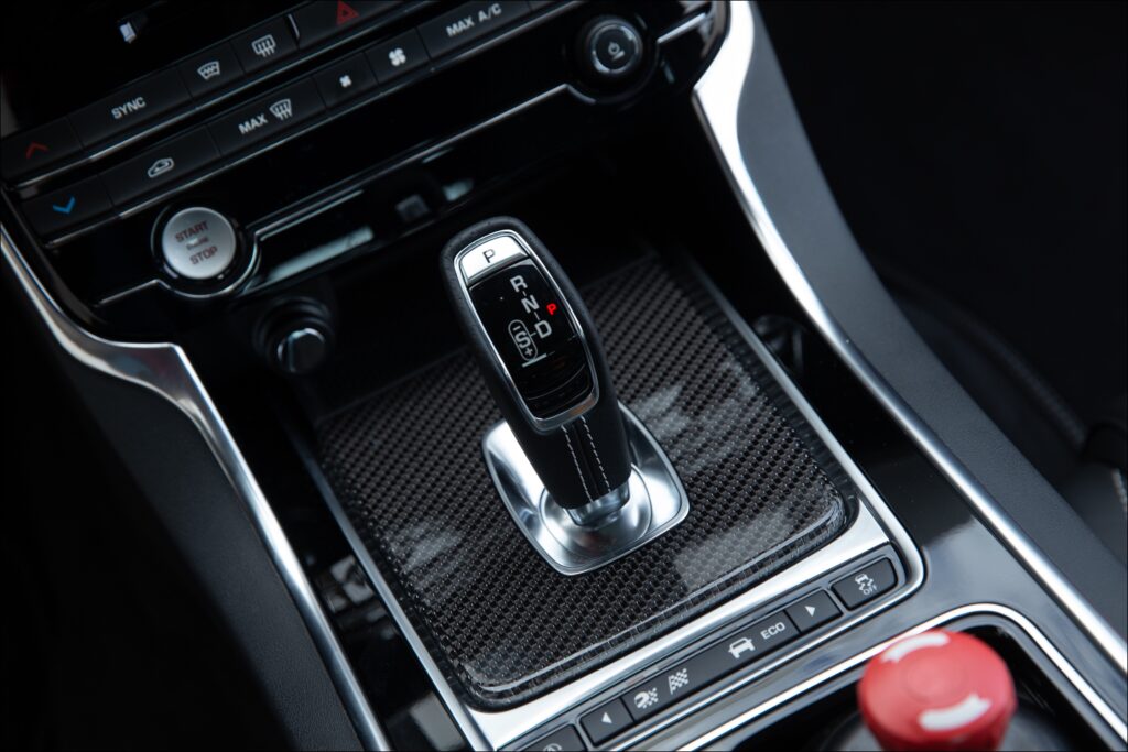 Transmission and related all-wheel drive system was first proven in the F-type SVR. It has been neatly adapted to life in an upright 4-door sedan. Shifts are accomplished in 200 milliseconds, rivaling dual-clutch gearboxes. With 516-lb. ft. of torque between 3500 and 5000 rpm, the gearbox is a wonderful play friend. It is also dramatically quieter and more refined than the dual-clutch transaxle of Project 8’s most obvious comparator, the NISMO GT-R. 